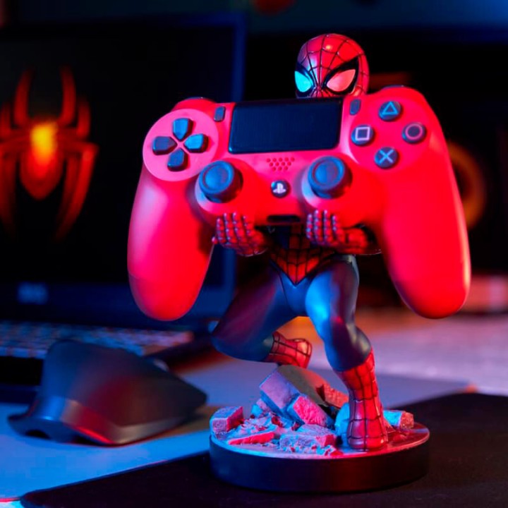 EXQUISITE GAMING Soporte para mando y móvil con figura